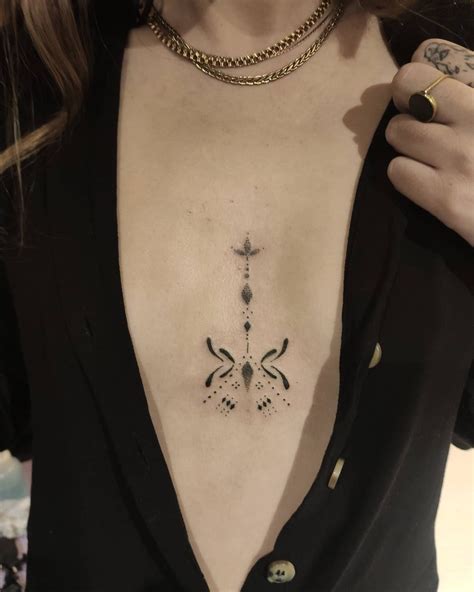 small tattoos between breast|Top 10 small between breast tattoo ideas and inspiration